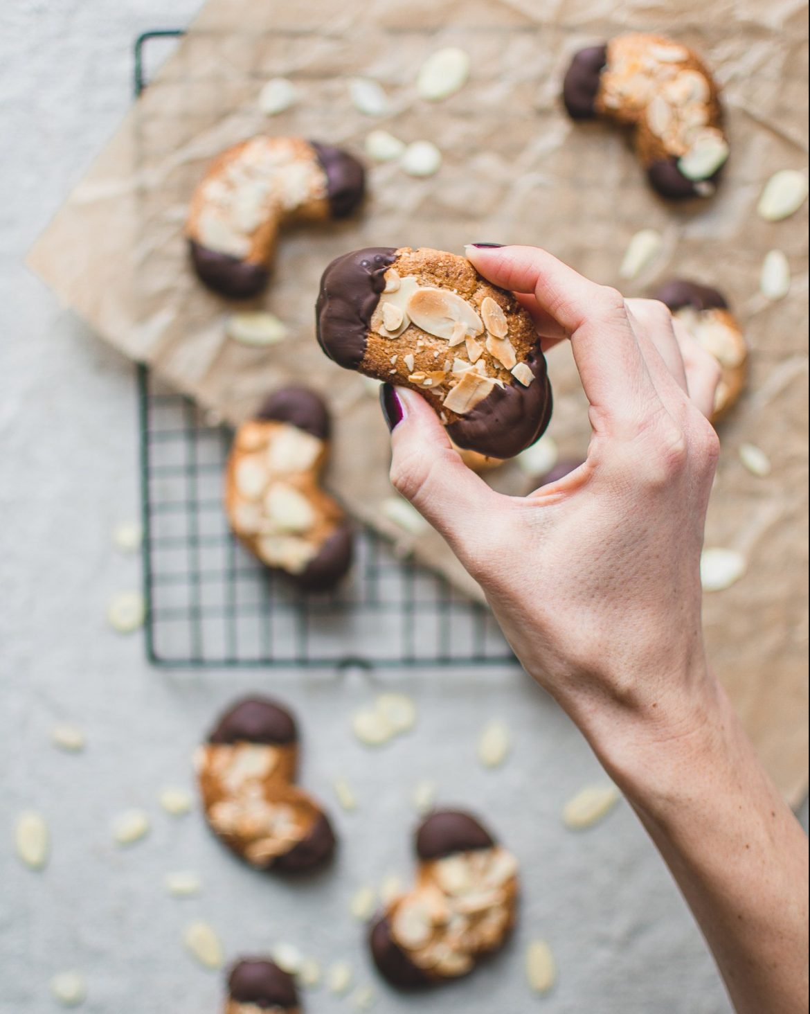 Chocolate dipped marzipan almond horns are very popular cookies in Germany (Mandelhörnchen). They are especially great for Christmas and I’m sure you gonna love this vegan, eggless recipe! #almond #almondflour #almondpaste #glutenfree #chocolate #cookies #christmas
