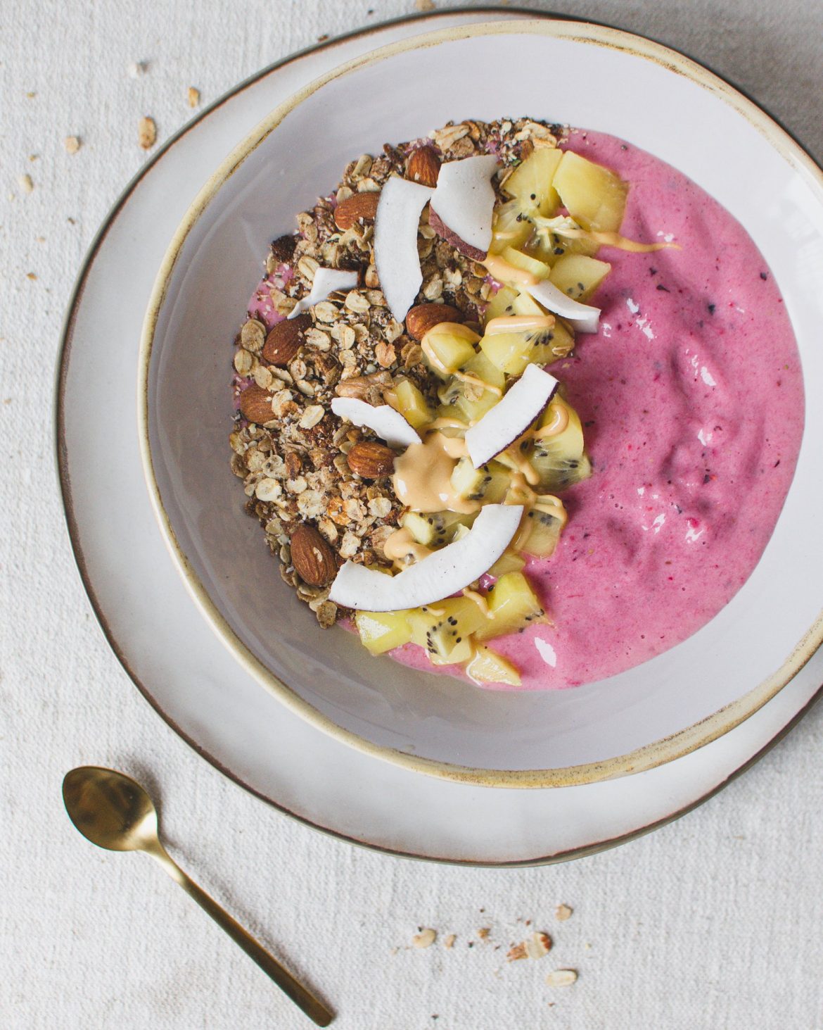 Selfcare Smoothie Bowl with pineapple, banana, and berries for the perfect start into the day.